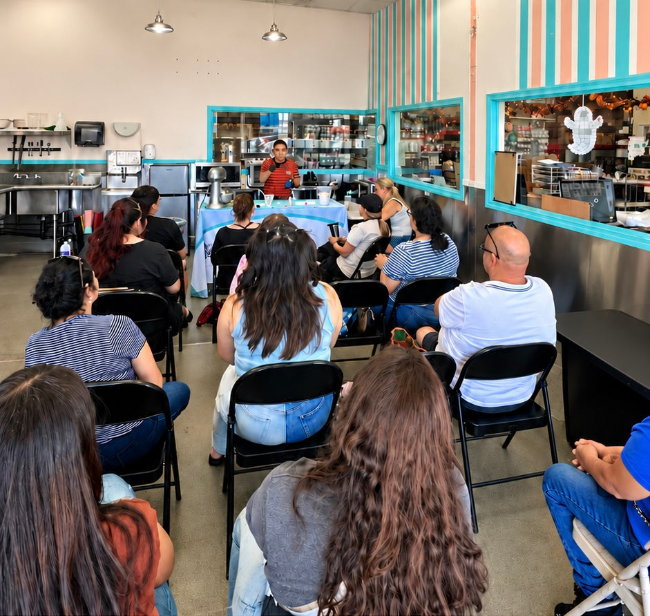 Attendees watching a baking demonstration in the Bakers Express classroom